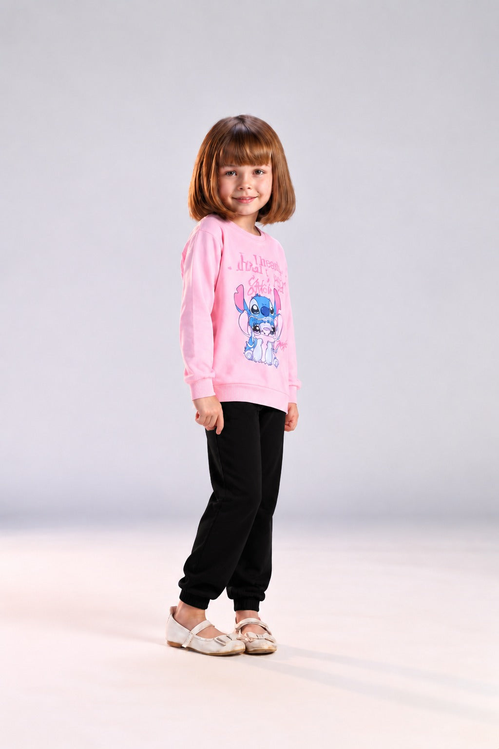 Girls’ Pink Stitch Graphic Sweatshirt & Black Jogger Pants Set – Casual Kids’ Outfit