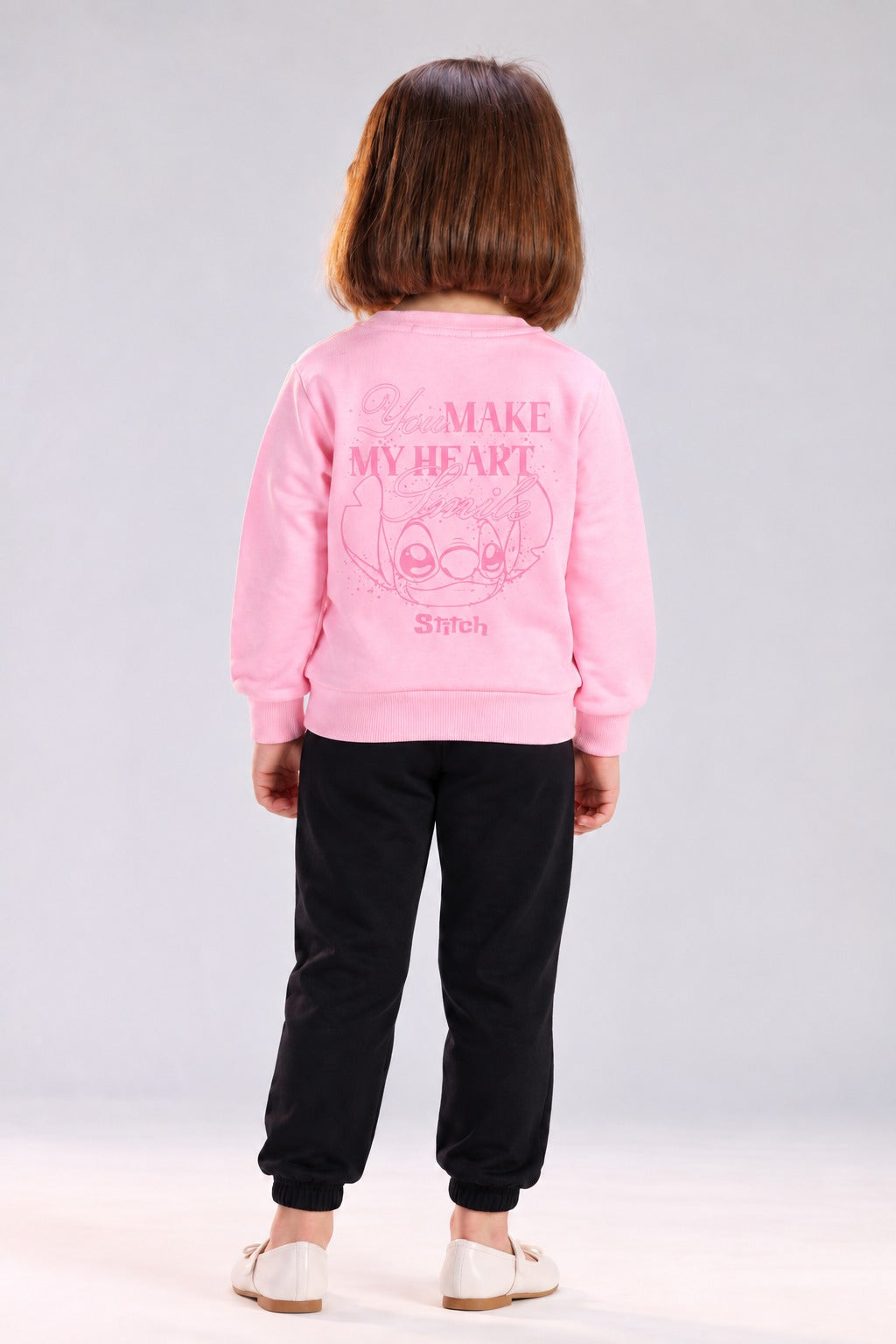 Girls’ Pink Stitch Graphic Sweatshirt & Black Jogger Pants Set – Casual Kids’ Outfit