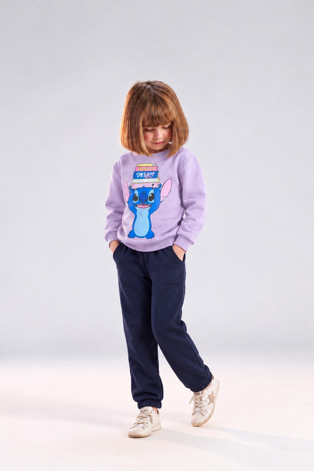 Girls’ Purple Stitch Graphic Sweatshirt & Navy Jogger Pants Set – Casual Kids’ Outfit