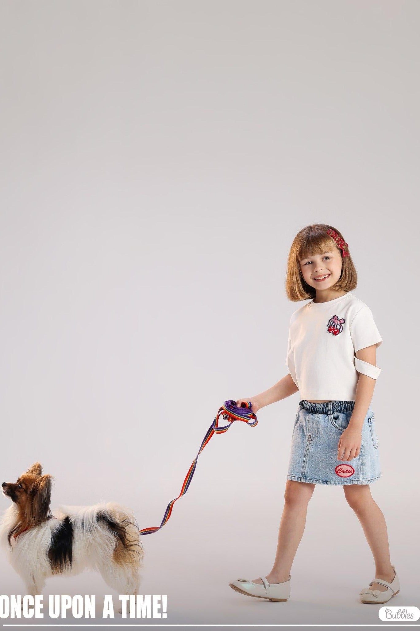 Girls Light Wash Denim Mini Skirt with Elastic Waist & Cute Patch Detail