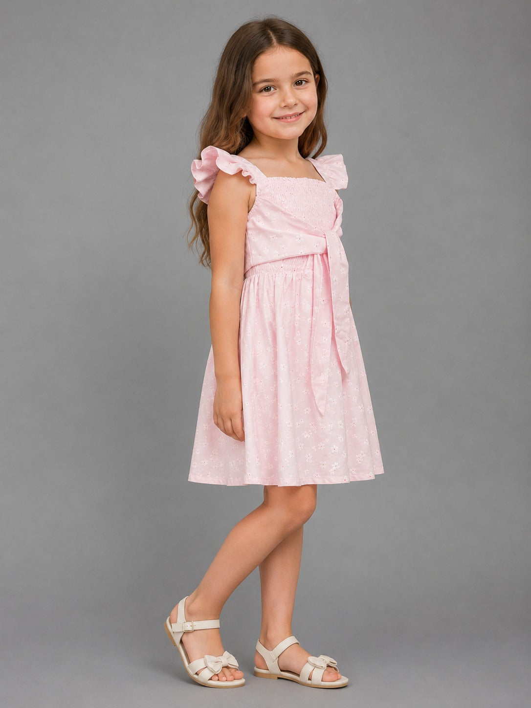 Girls' Pink Smocked Floral Dress with Bow Detail – Elegant Sleeveless Summer Dress for Kids