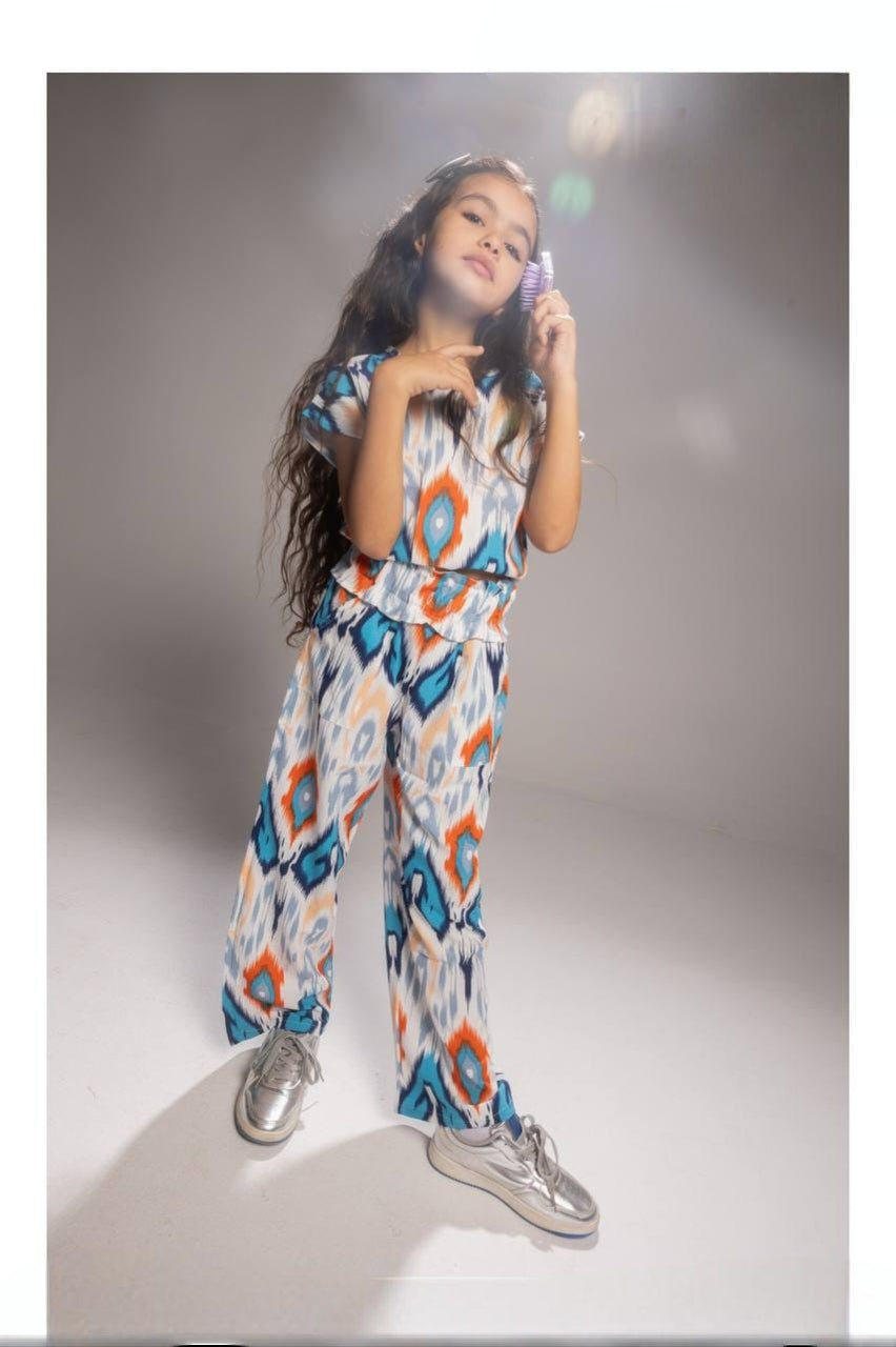 Girls’ Printed Wide-Leg Pants Set – Short-Sleeve Top & Relaxed Trousers with Colorful Geometric Pattern